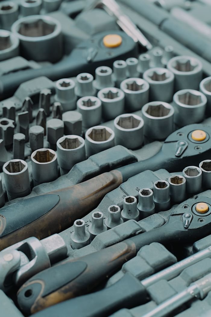 Detailed view of a ratchet and socket tool set, ideal for mechanics and DIY projects.